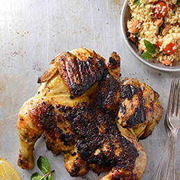 Lemon and herb chicken spatchcock served with a minty couscous